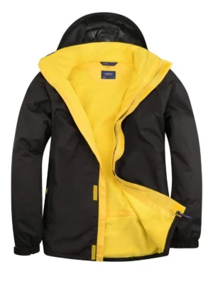 Uneek UC621 black waterproof jacket with yellow lining, open front view