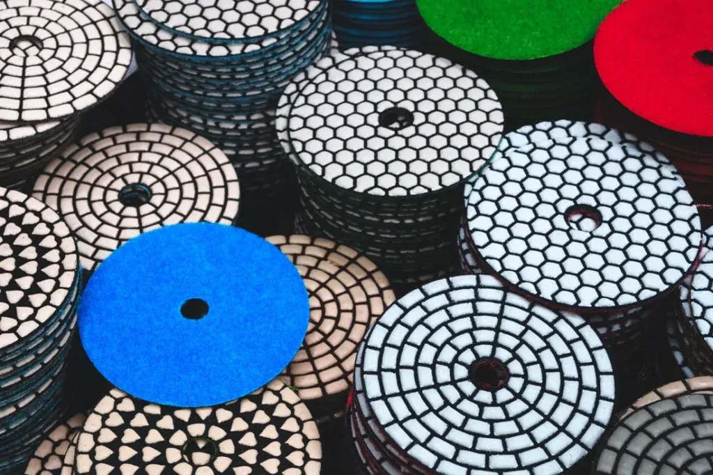 Stacked colorful diamond grinding and polishing discs